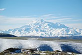 Двуглавый Эльбрус — высочайшая гора в России и Европе[50] (герб и флаг КБР и Нальчика)