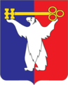 Белый медведь с ключом — герб и флаг Норильска