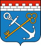 Якорь, ключ и крепостная стена (символы ключевого для страны выхода к морю) — герб и флаг Ленинградской области
